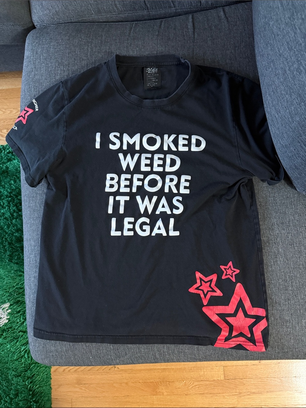 Bongia Mens Black Graphic Tee with Bold White Slogan and Pink Star Accents